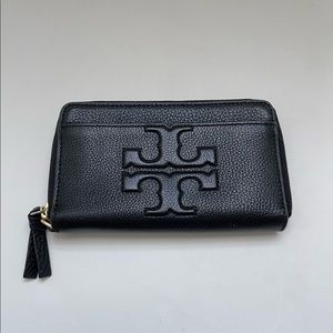 Tory Burch black leather long wallet with zip closure
